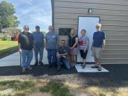 Council in front of new shop