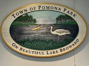 Pomona Park town logo featuring a Sandhill Crane and Lake Broward